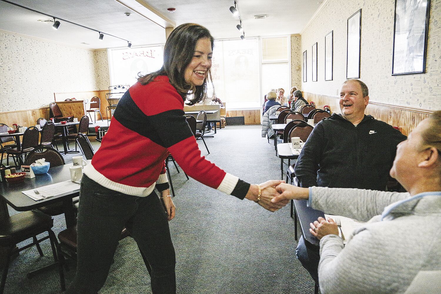 01-20-24 Ayotte at Bea's shaking hands diner